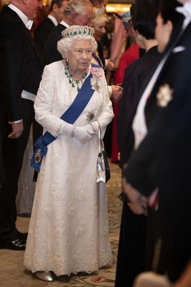 The Vladimir tiara has a famous history. Queen Elizabeth II inherited the headpiece from her grandmother, Queen Mary, but it originally belonged to the Grand Duchess Maria Pavlovna of imperial Russia. During the Bolshevik Revolution in the early 1900s, the duchess and her family fled Russia, where her jewels were left hidden in a vault at the palace in St. Petersburg. British intelligence officers smuggled the jewels (including the tiara) out of the city and into the hands of the Grand Duchess's family, who subsequently sold the tiara to Queen Mary.

Photo: Getty