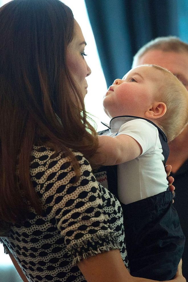 Duchess Kate makes a face at baby Prince George while at an event in Wellington, New Zealand.
Photo: Getty