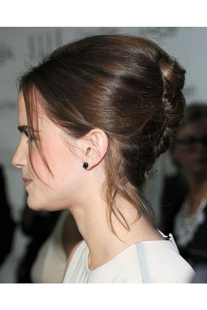 A classic French twist looks cool–not stuffy—when face-framing pieces are left loose and untucked.