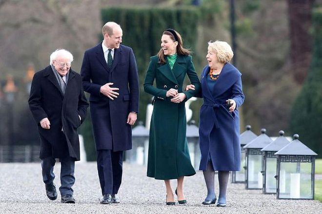 The Duke and Duchess of Cambridge stroll lightheartedly with the president and his wife on the grounds of the president's residence in Phoenix Park.

Photo: Getty
