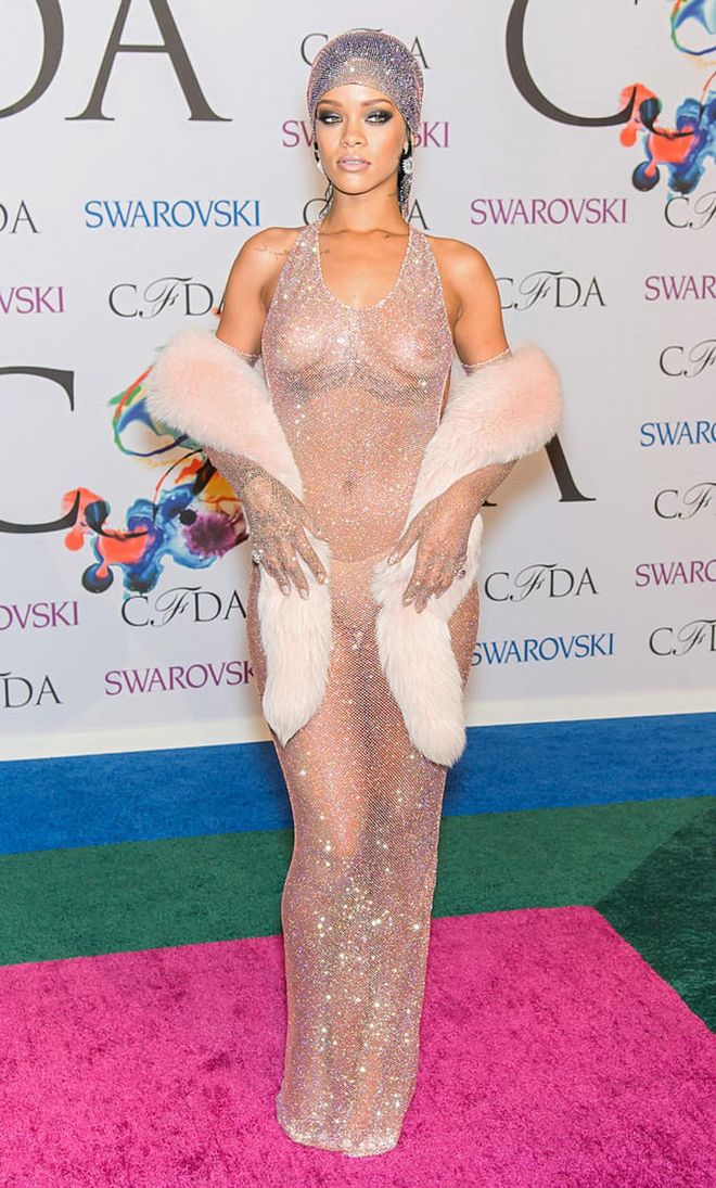 Rihanna accepted the CFDA's Style Icon Award in 2014 wearing a sparkly mesh dress designed by Adam Selman. "We dyed the mesh to be her exact skin tone," Selman told Elle, and applied over 230,000 plain and colored crystals to the fabric, which revealed pretty much everything that was going on underneath. It was intentional, of course, but if she could do it all again, Rihanna would change one thing. "Could you imagine the CFDA dress with a bra? I would slice my throat," she told Vogue. "I already wanted to, for wearing a thong that wasn't bedazzled. That's the only regret I have in my life."