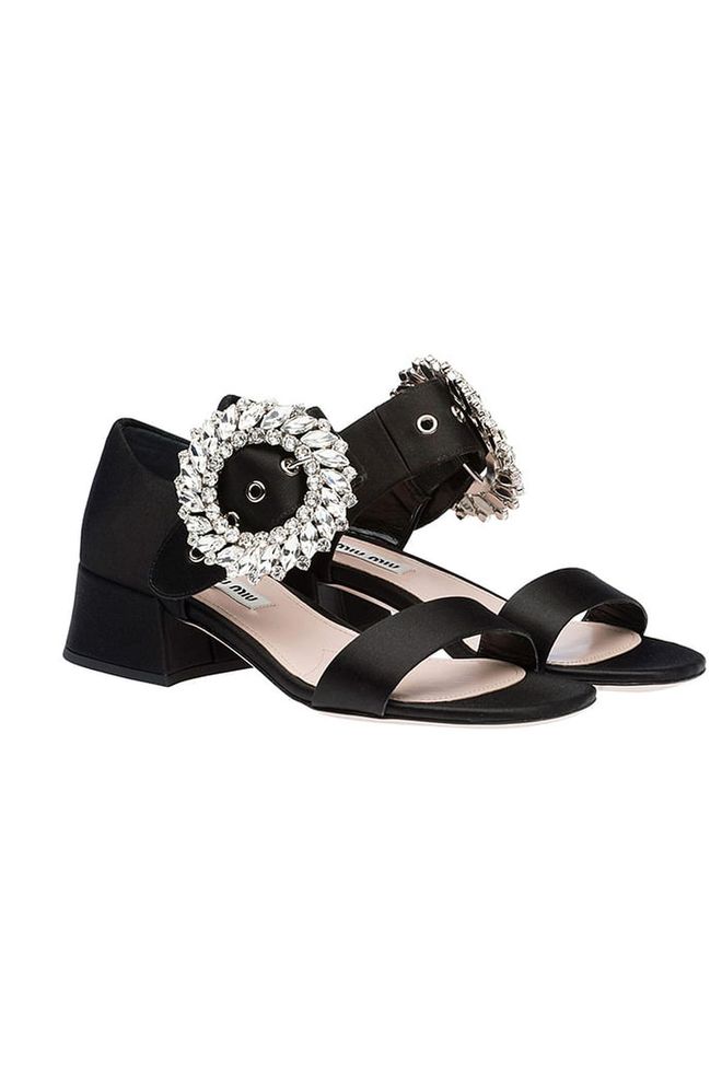 Make like a modern Marie Antoinette in Miu Miu's bejewelled satin sandals.
Crystal sandals, £790, Miu Miu.