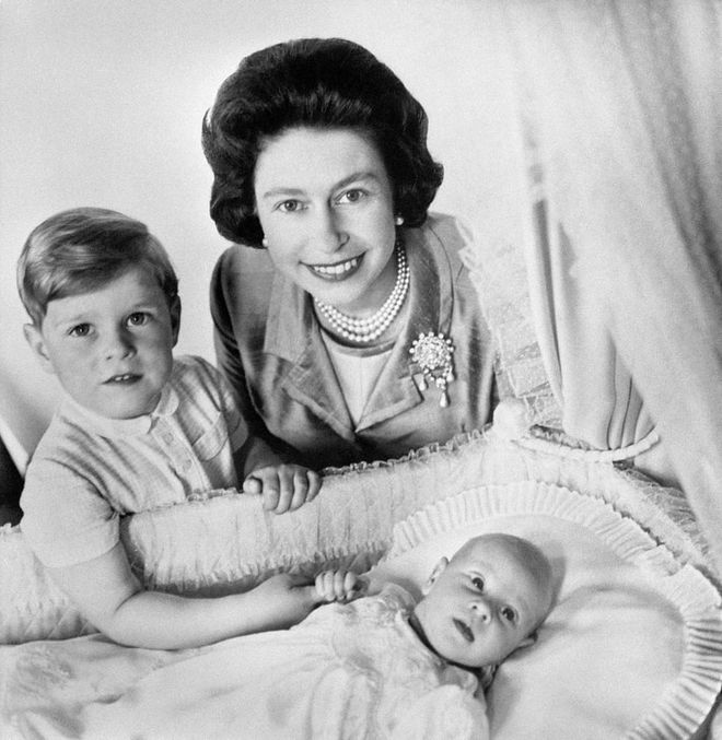 In 1964, the Queen and Prince Philip welcomed their fourth child, Prince Edward. The newborn is photographed here with big brother Prince Andrew.
Photo: Getty 
