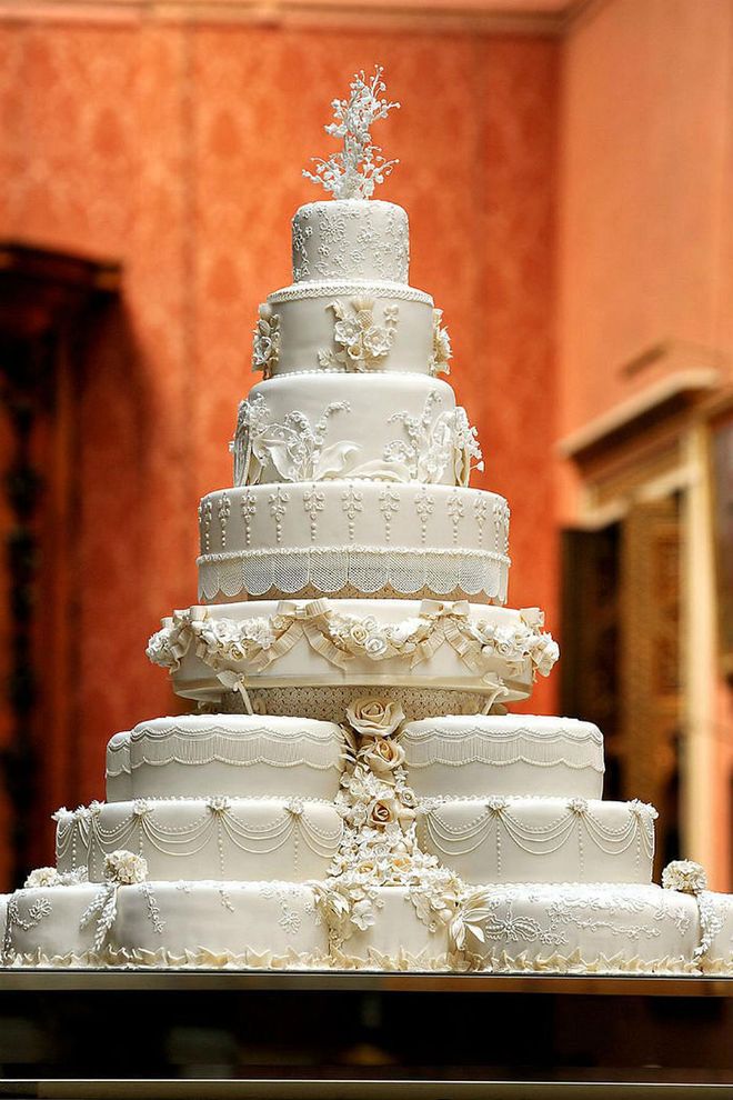 Fiona Cairns created a multi-tiered traditional fruitcake decorated with cream and white icing for the reception.Photo: Getty