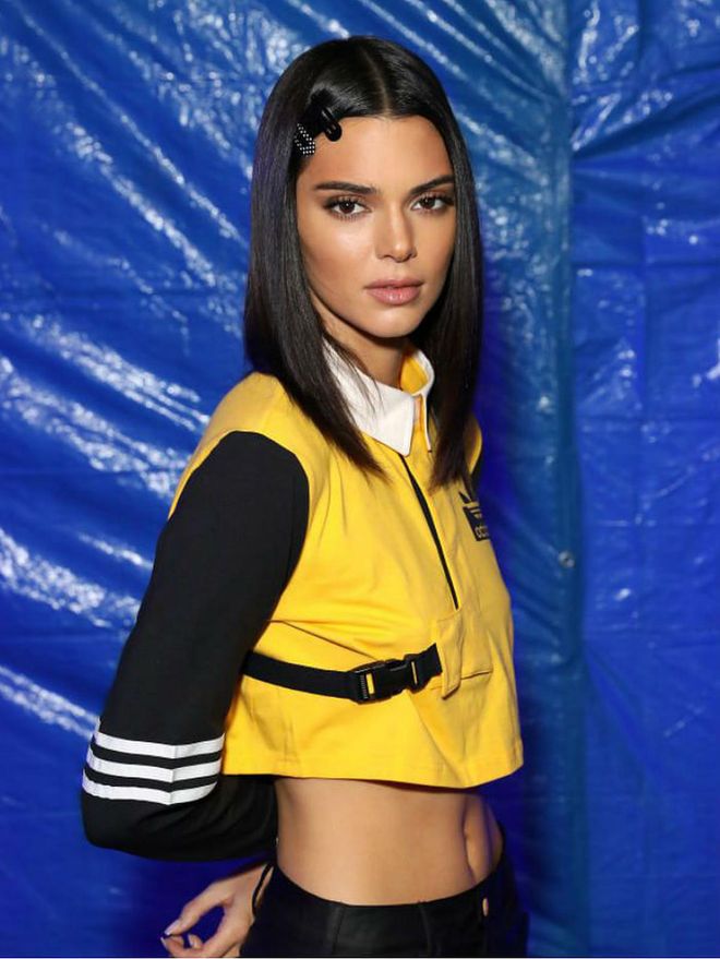 A sleek lob accented with two '90s-style snap clips along the hairline at an event for Adidas.