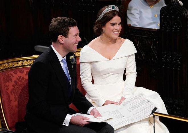 Princess Eugenie and Jack seated at the alter during their ceremony.