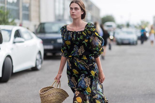 Basket bags and summer frocks make for a surprisingly city-appropriate look this season. Photo: Getty 