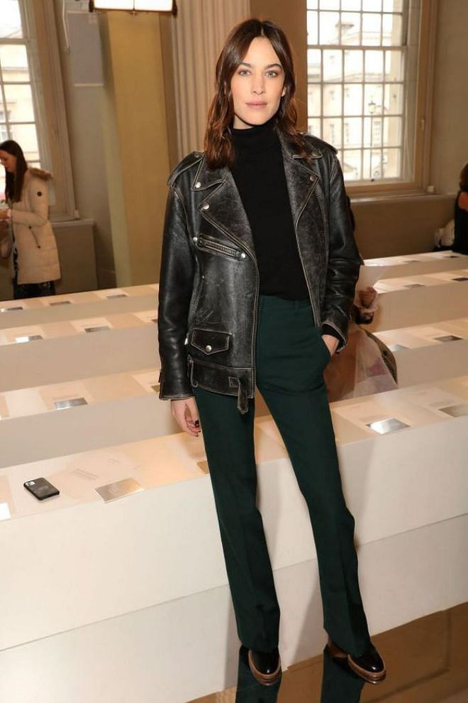 Alexa Chung kept things casual in a leather jacket and emerald green trousers.

Photo: Darren Gerrish / Getty