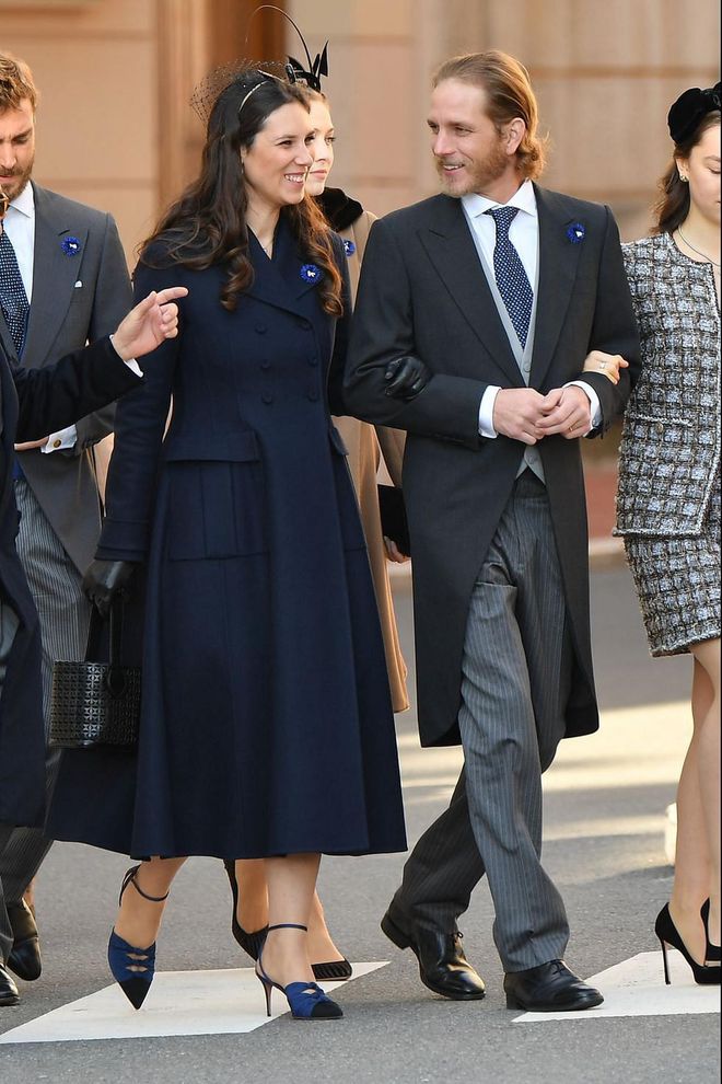 Andrea Casiraghi looks dapper as he arrives with his wife Tatiana Casiraghi, who stepped out in a navy coat, a black netted fascinator, and blue and black pointy-toe shoes.

Photo: Getty