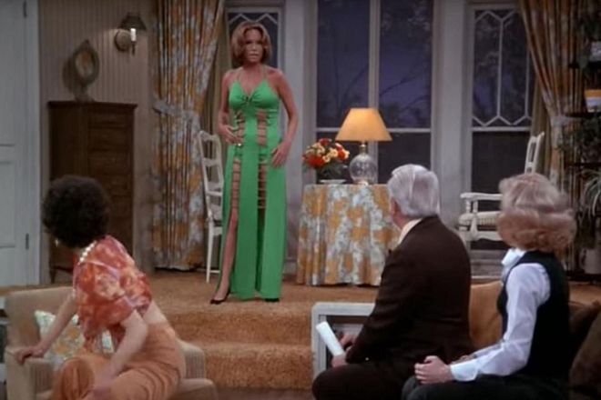 In the fifth season of The Mary Tyler Moore Show, Moore's character Mary Richards wears a green dress designed by a friend (a former prostitute). Upon seeing Mary in the revealing cutout dress, the live audience responded with shrieks and cheers. Mary's friend Ted Baxter says, "Get me a glass of water," because ~thirst~. Mary thinks it looks horrible, Ted thinks it looks fantastic. Whatever the case, the dress was certainly memorable.