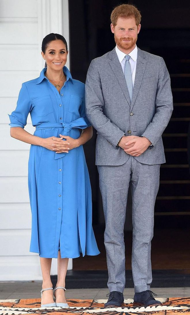 For their final engagement in Tonga, Meghan wore a bright blue Veronica Beard dress with Banana Republic Madison heels. 