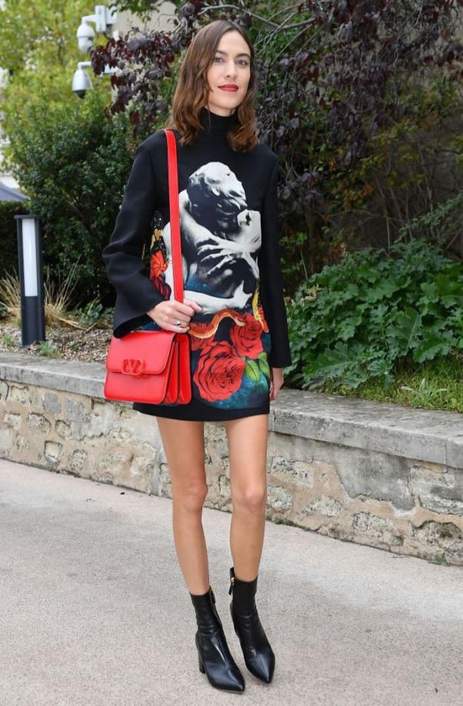 Alexa Chung opted for sock boots and a printed dress.

Photo: Getty