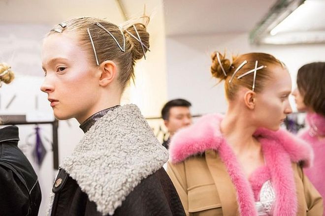 We bet you never thought of wearing a hair pin or barrette the way hairstylists used them backstage at Annakiki, zig-zagging them across sleek buns. 