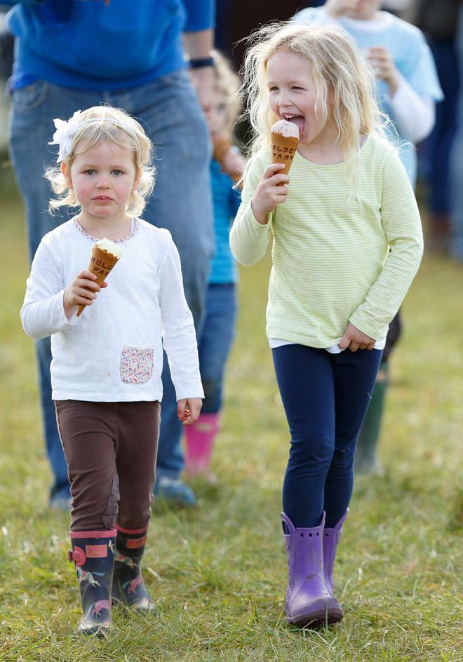 Isla and Savannah Phillips grab ice cream while at the Gatcombe Horse Trails.
Photo: Getty