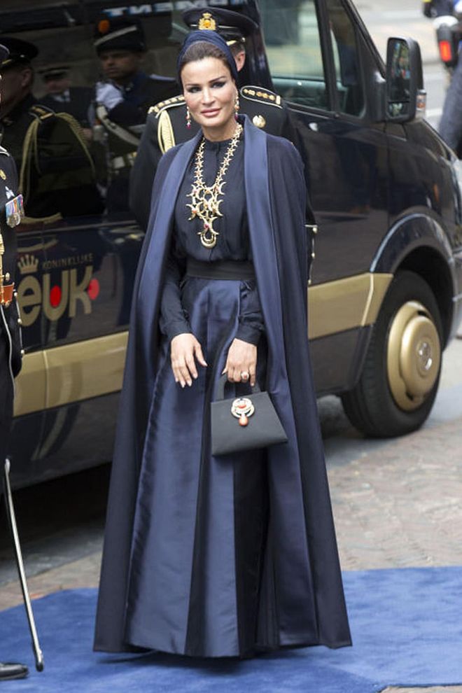 Here, she's had a Valentino couture cape and dress customised, which she then accented with oversized David Webb jewellery.