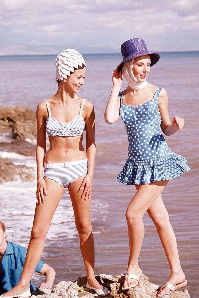 Two models show off swimwear styles of the decade. Photo: Getty 