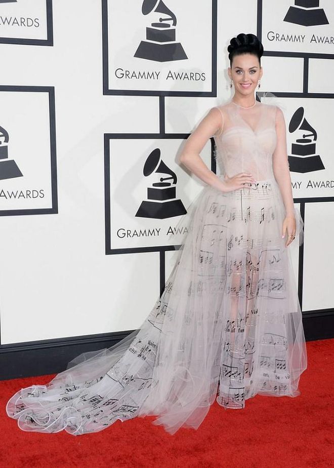 Katy Perry dressed for the occasion in a stunning sheer Valentino Haute Couture emblazoned with music notes.