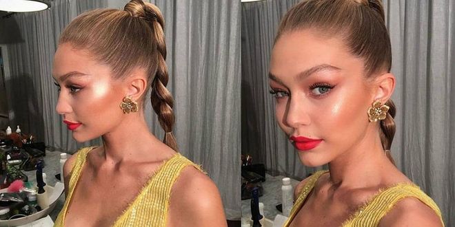 Gigi Hadid joined the ranks of celebrities with beauty lines this year with a collection for Maybelline New York. Our favorite look was this blinding golden highlighter and orange-red lipstick.