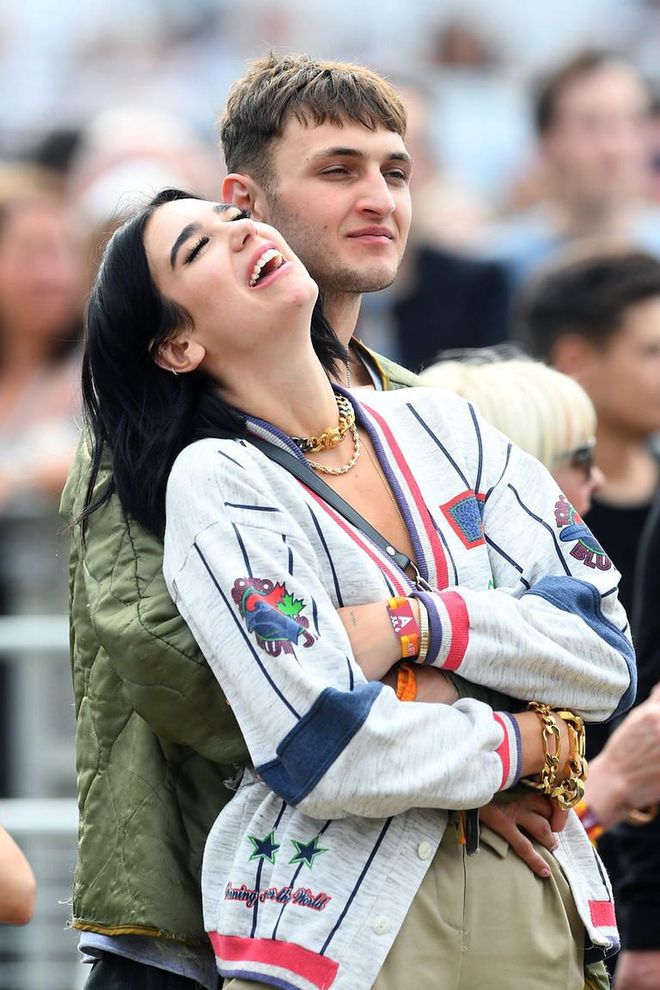 Lipa laughs in Hadid’s arms at the British Summer Time festival in Hyde Park on July 6. Photo: Getty