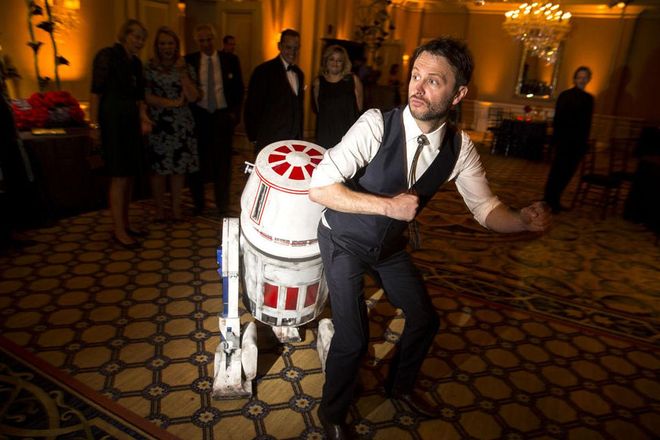 e unconventional sci-fi touches trickled through the not-so-basic reception–like an appearance from R2D2. Photo: Lara Porzak
