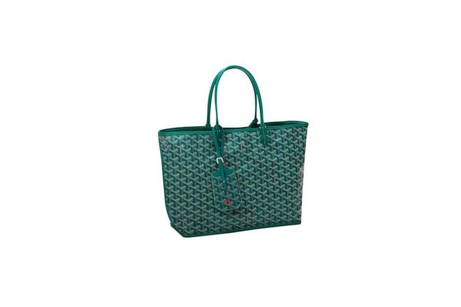 "Goyard totes are light but really strong, so I can carry my laptop and camera easily. Also makes a great beach bag!" ; Photo: Courtesy of the designers