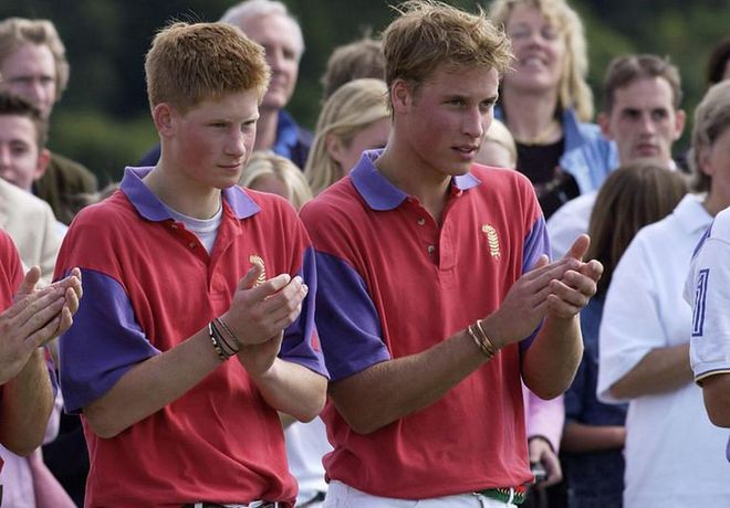 19-year-old Prince William and 17-year-old Prince Harry clap after winning a polo match in Gloucestershire.
Photo: Getty 