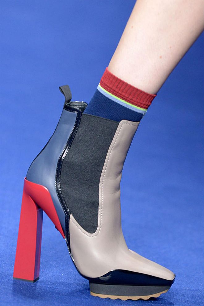 Seen in: Milan Fashion Week SS17 // These booties by Versace look super easy to slip into. But it's the multi-coloured leather panels that make these shoes to-die-for  (Photo: Getty)