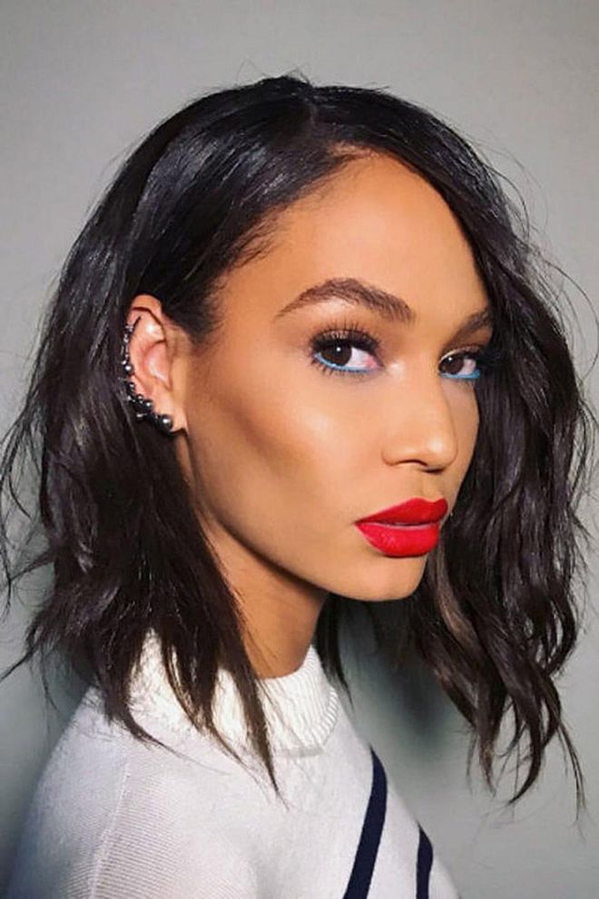 The model paired a matte red lipstick with teal eyeliner on Instagram earlier this year.

