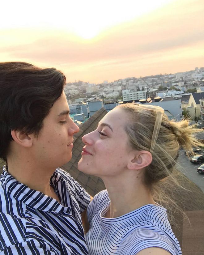 Lili shouted out her actor boyfriend Cole Sprouse on IG with a photo of the pair lovingly gazing at each other on a rooftop while the sun sets in the background.