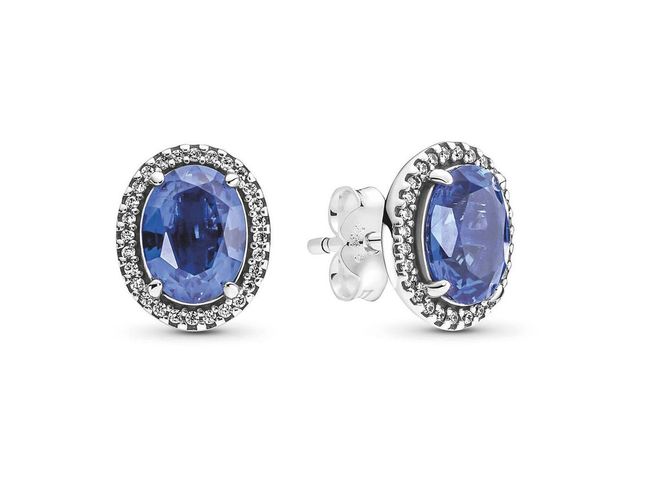 Sterling silver Sparkling Statement Halo stud earrings with princess blue crystals, $159 (Photo: PANDORA)