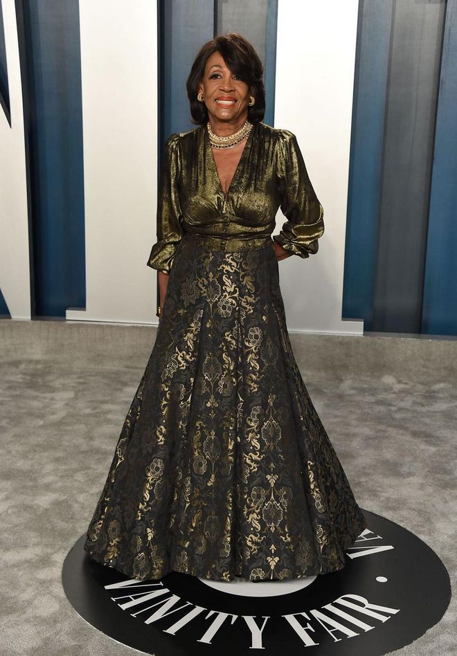 In a gold brocade gown. Photo: Getty