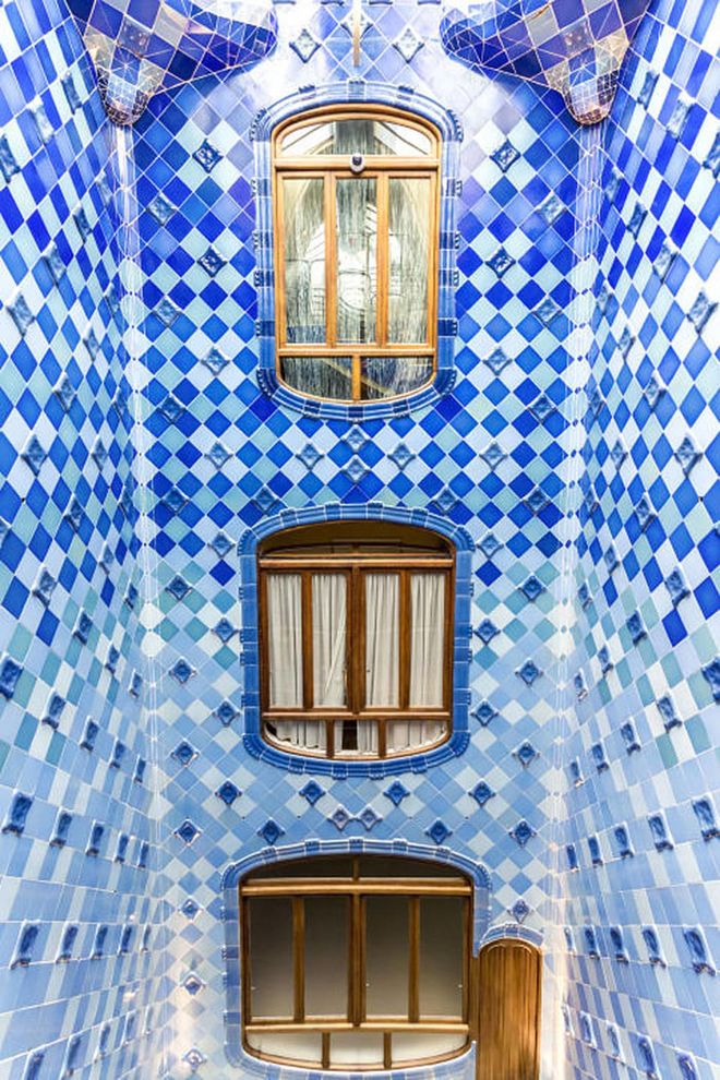 Gaudí had an amazing eye for detail and never let any surface go untouched—not even the interior courtyards of Casa Batlló, which he covered with blue mosaic tiles.