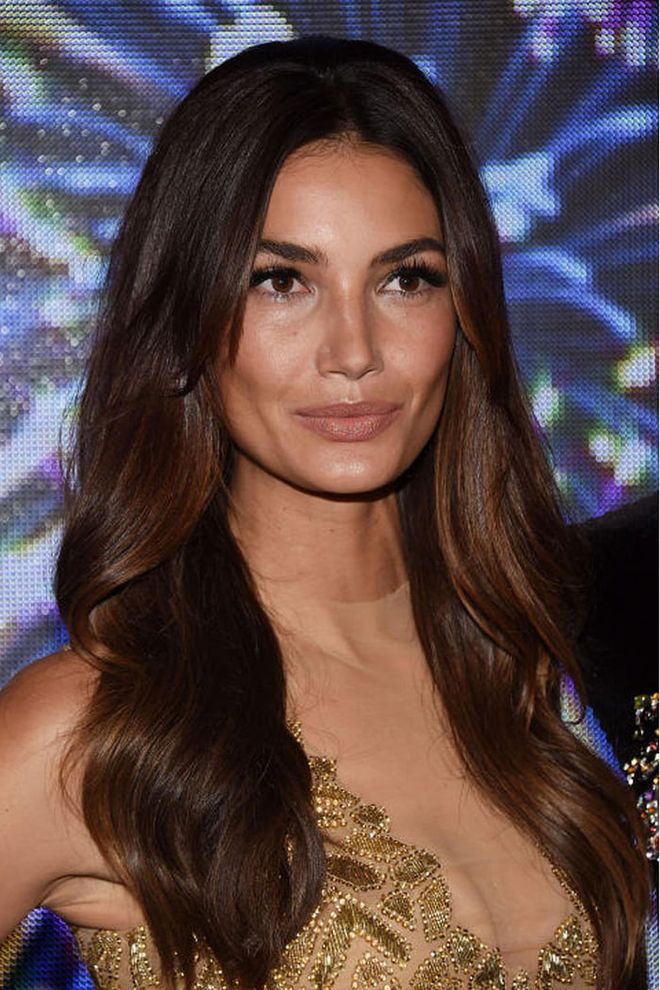 The Victoria's Secret model was an early adopter of ombre colour, but she's always stayed true to her dark-toned hair.  Photo: Getty