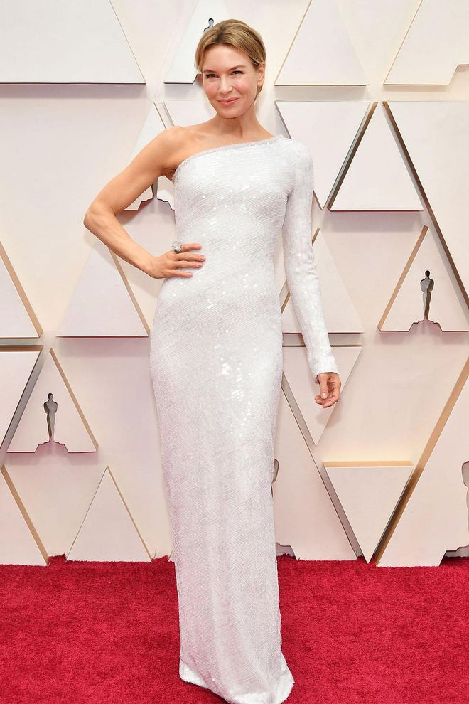 What: Armani Prive gown and David Webb ring

Why: What's not to love about a minimal shape, white-sequin, one-shoulder gown? It's form-fitting, flattering, minimal, and cool. The actress' short hair complements the look perfectly. Photo: Getty