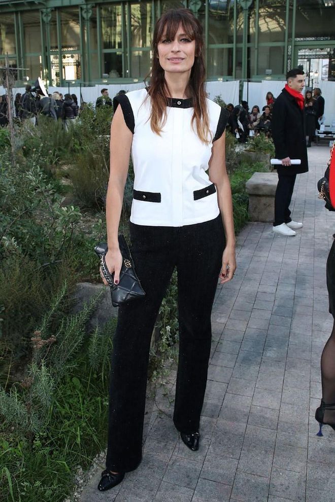 Caroline de Maigret attended the show in a classic monochrome look.