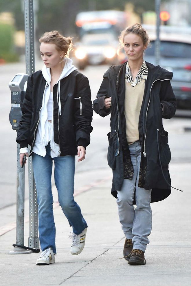 Like mother, like daughter: Vanessa Paradis and Lily Rose Depp went for a walk in coordinating blue jeans, black parka jackets, and layered shirts. Each putting their own twist on the look, the modeling duo still looked like twins. Photo: SplashNews