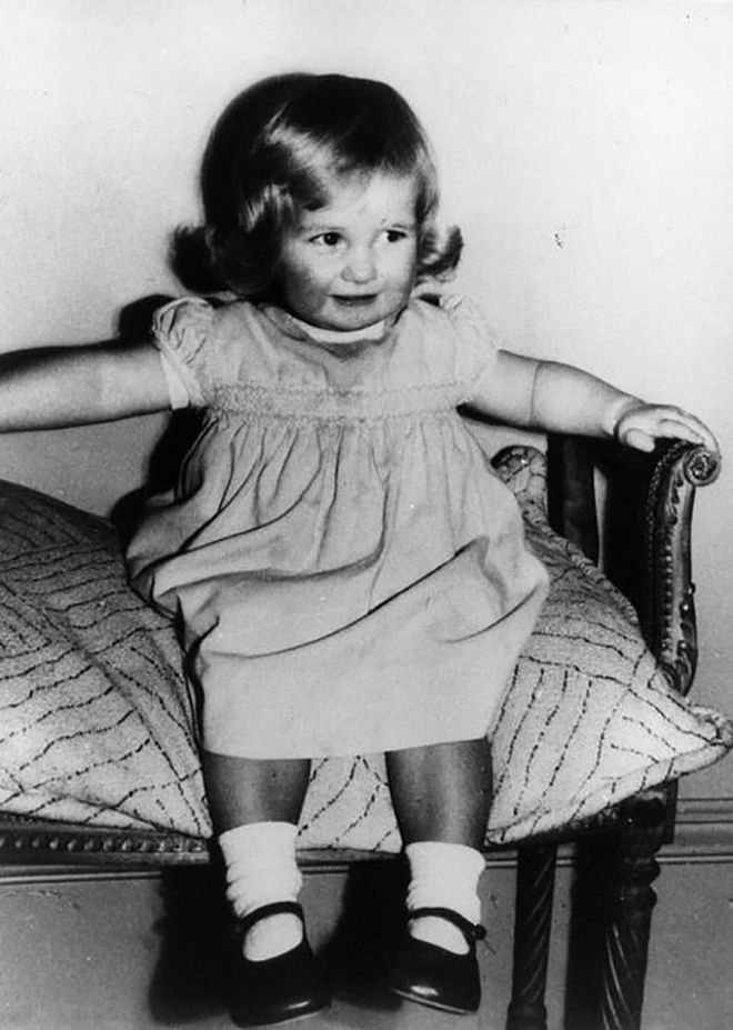 Princess Diana as a chubby-cheeked two-year-old at Park House, Sandringham, Norfolk. Early in her childhood, she and her family lived in a rented property on the Queen's estate.

Photo: Getty