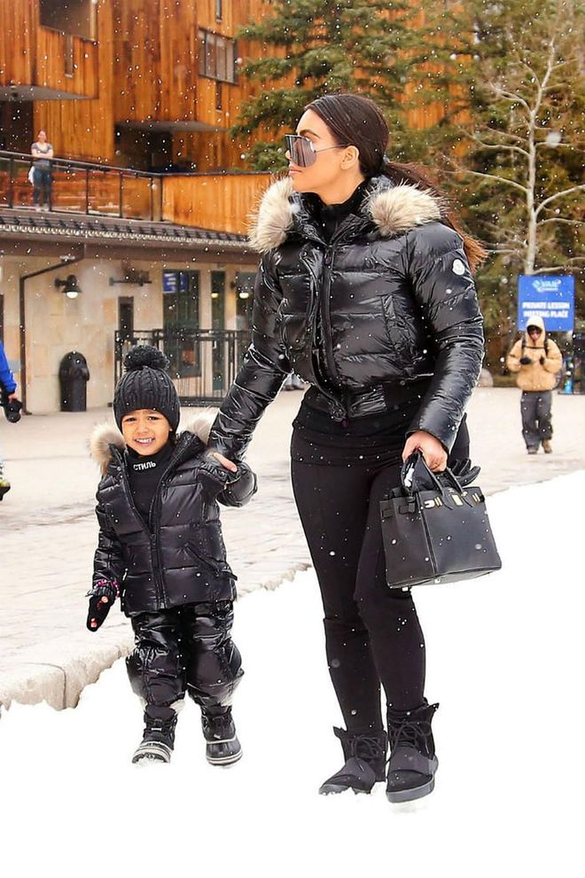 Taking to the slopes, the reality star and her toddler-aged daughter sported the same black Moncler puffer coats for a luxe bundled up look.

Moncler puffer coat, $1,765, ssense.com. Photo: SplashNews