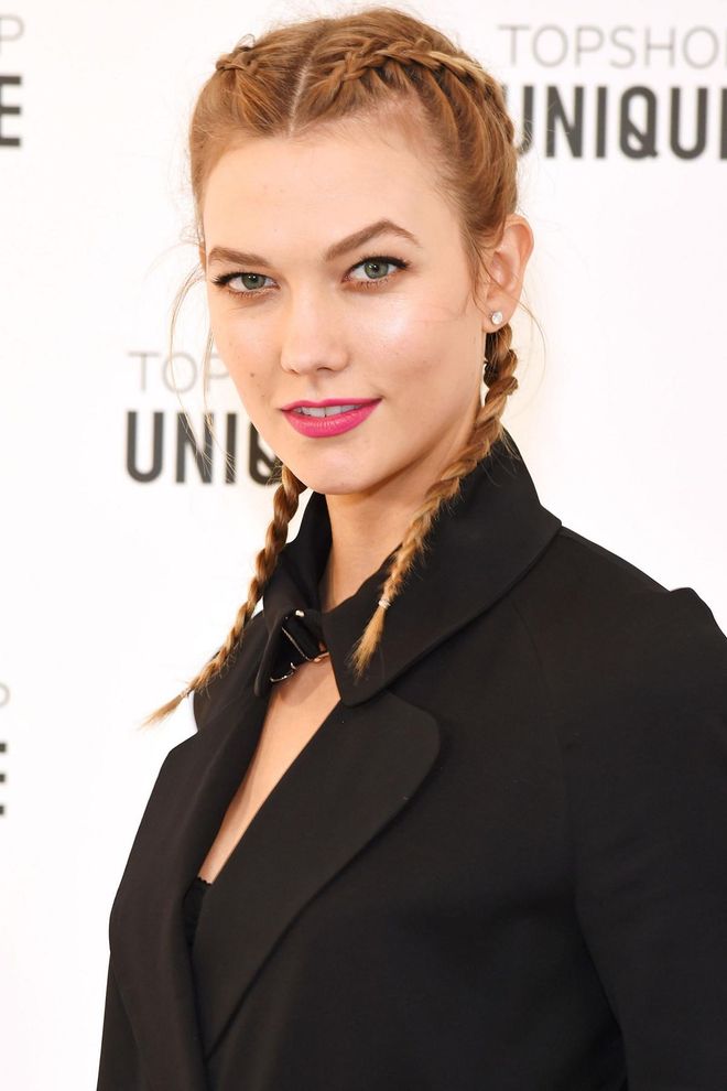 Make tight enough boxer braids and you won't even have to think about your bangs for a few days. Photo: Getty