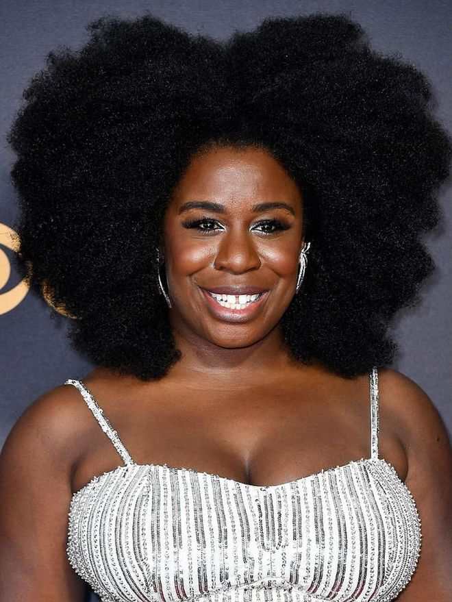 Uzo Aduba owned the red carpet at the 2017 Emmy awards by rocking big, beautiful, natural curls. The inspiration? Diana Ross, of course.