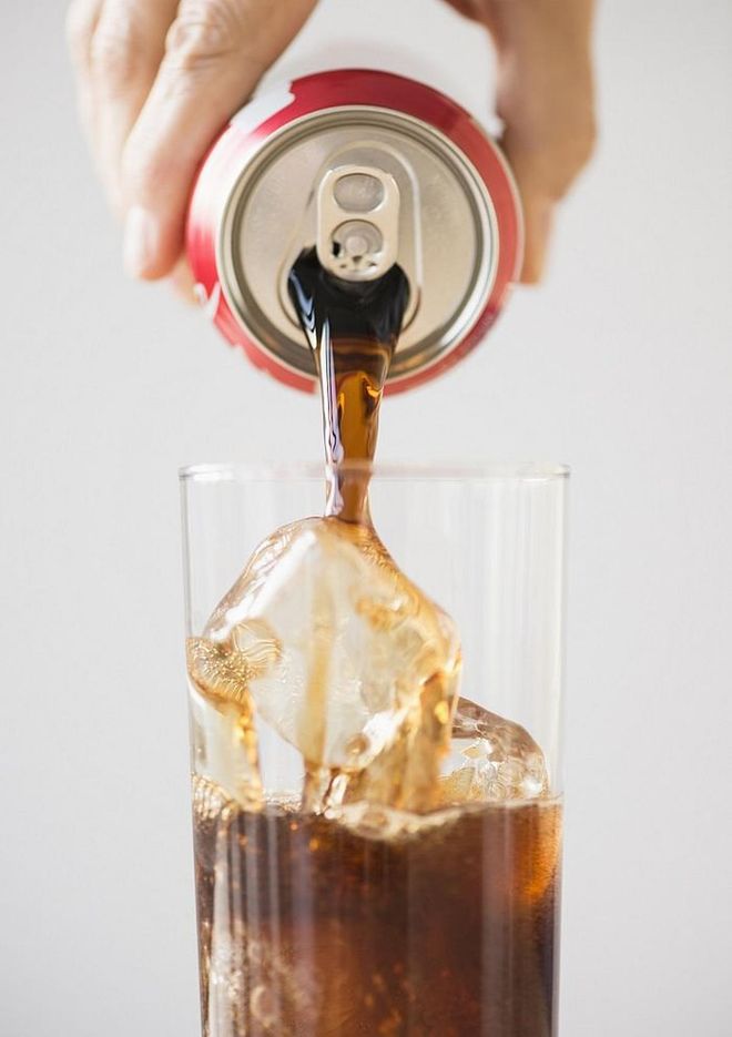 The sugar in a can of fizzy drink gets a bad rap, but the carb count is just as bad: one can of Coke has 39 grams. Photo: Tetra Images