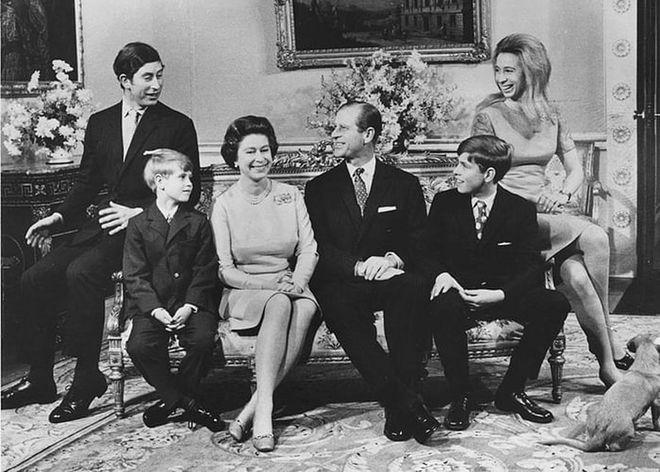 Queen Elizabeth II and the Duke of Edinburgh celebrate their 25th wedding anniversary with their children Prince Charles, Prince Edward, Prince Andrew, and Princess Anne at Buckingham Palace.