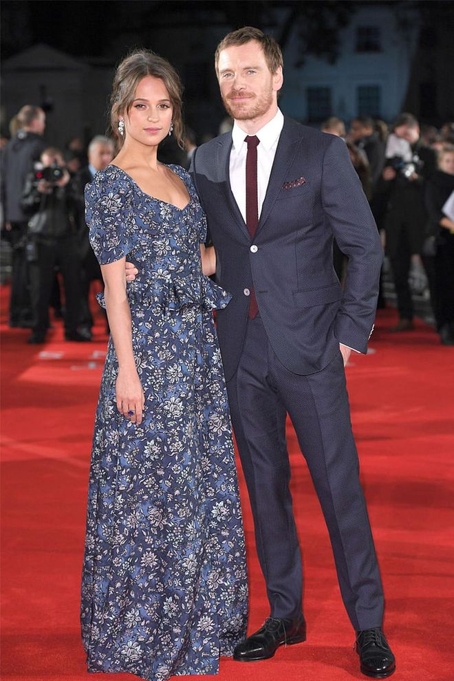 Hollywood's haute couple garnered some attention when they costarred as husband and wife in the summer drama, The Light Between Oceans. Their onscreen relationship gave light to their real-life romance and joint red carpet appearances. It also didn't hurt that Vikander, a new favorite of the fashion set, showed off impeccably chic style.