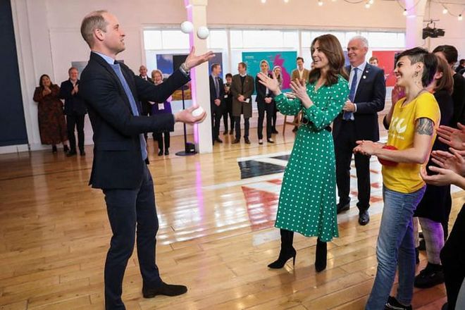 William juggles as Kate watches during a meeting with Galway Community Circus performers, local artists, and young musicians.

Photo: Getty