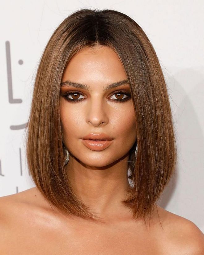 The slight curve to the ends of Emily Ratajkowski’s center-parted lob give the cut a hint of volume.

Photo: Getty