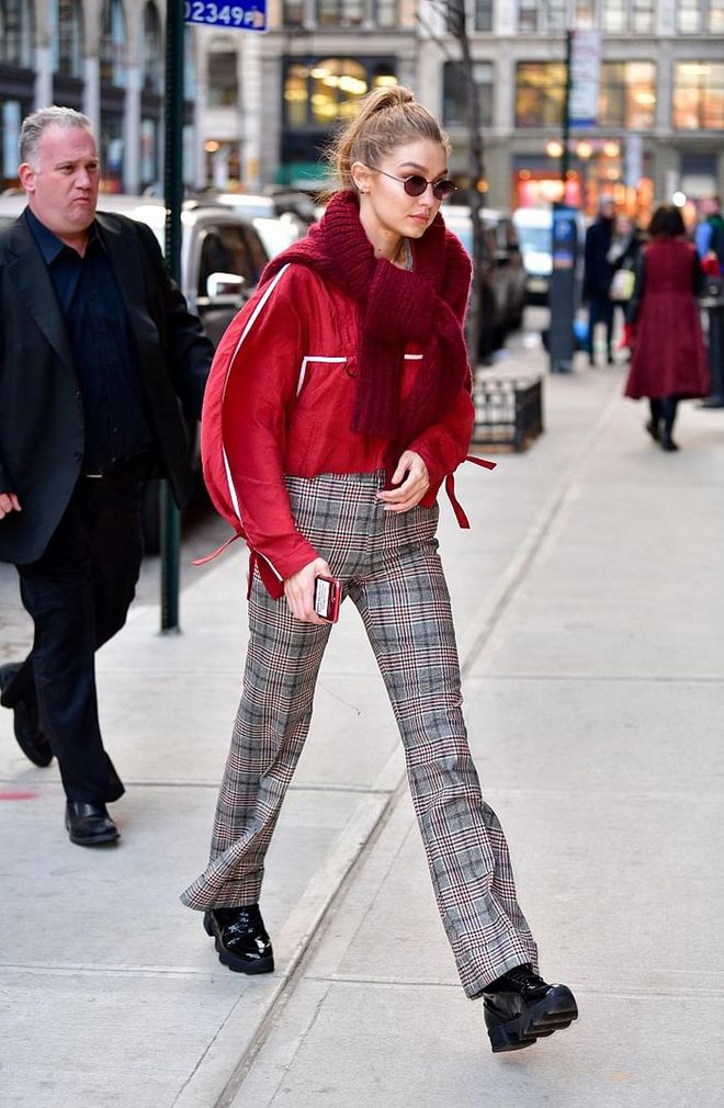 Simplicity in red! The red detailing on her trousers really help bring the look together. Love! Photo: Getty 