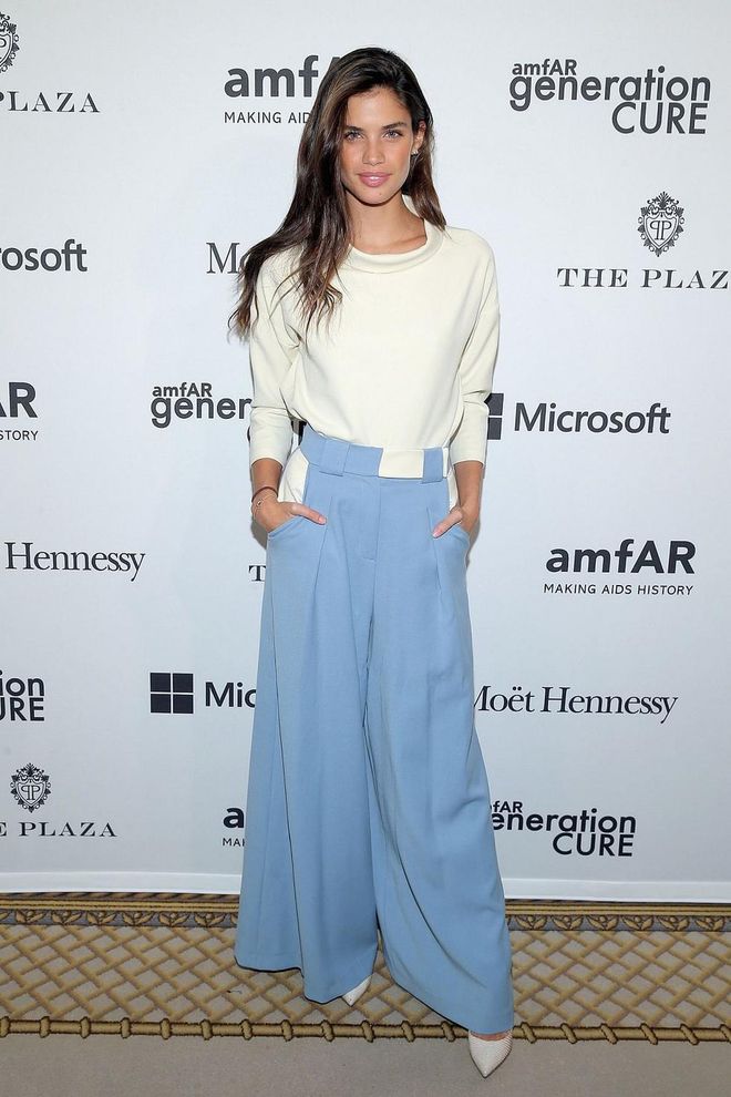 Model Sara Sampaio plays with pastels with her duck egg blue trousers. Photo: Getty 