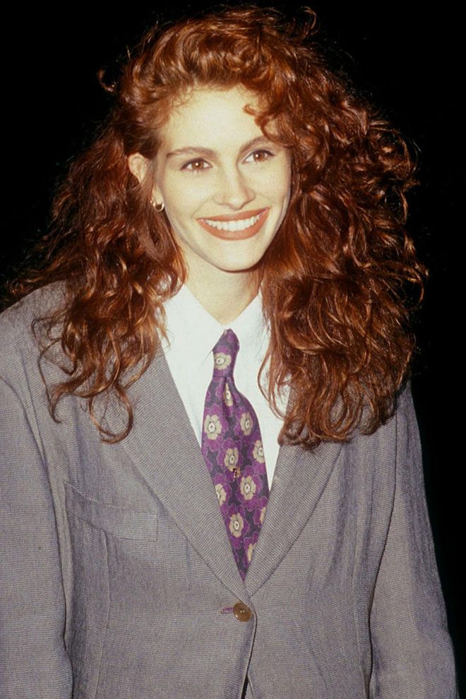 Julia Roberts' famous red curls turn a very '90s suit and tie into a timeless and quirky red carpet look. 
