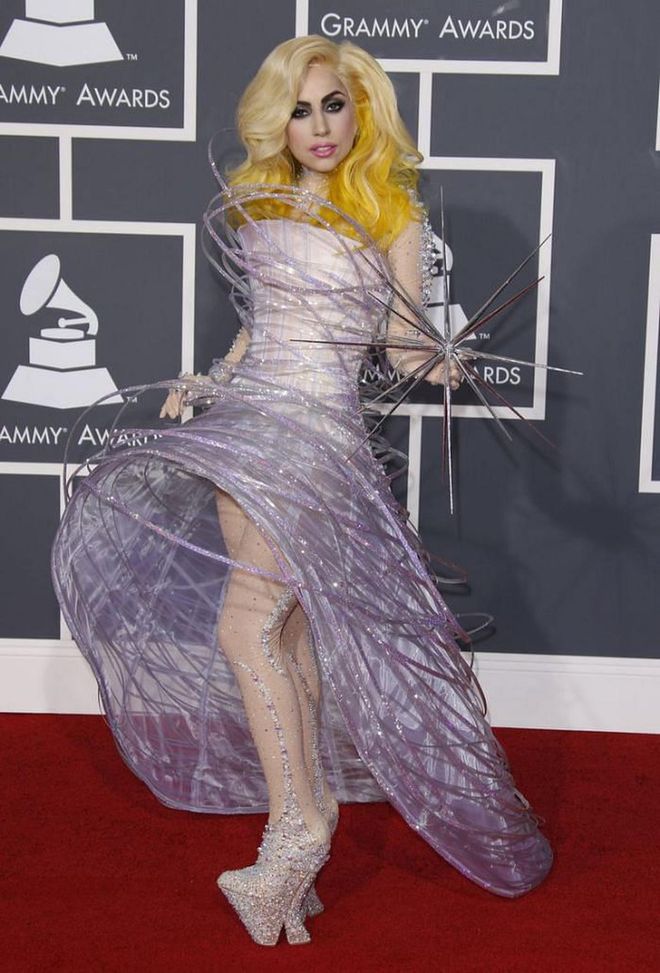 Giving us a real Gaga fashion moment, the singer went for an unconventional red carpet look at the 2010 Grammys. The singer wore a sculptural, space-like look by Armani Privé and bejeweled platform heels.