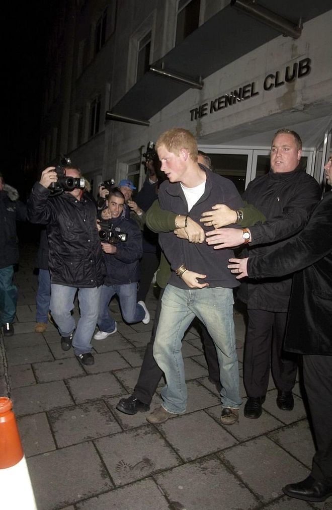 In 2004, Harry decided it was a good idea to get into a "scuffle" with a group of photographers who were taking his picture as he was leaving a nightclub, and everyone ended up injured. "Prince Harry was hit in the face by a camera as photographers crowded around him as he was getting into a car," a spokesperson said. "In pushing the camera away, it's understood that a photographer's lip was cut."
